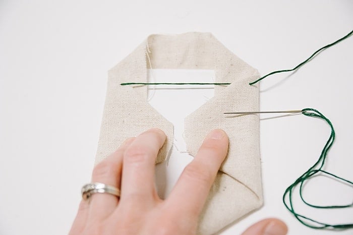 lacing stitch to secure two sides of embroidery