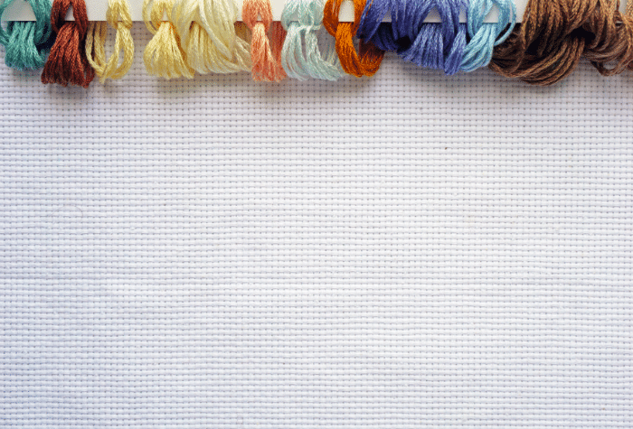 aida fabric for cross stitch projects with holes in it for counting X stitches