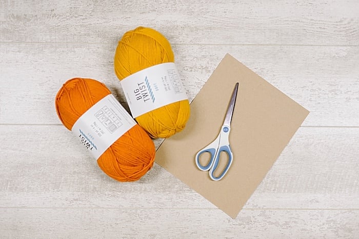 Supplies for making yarn tassels.