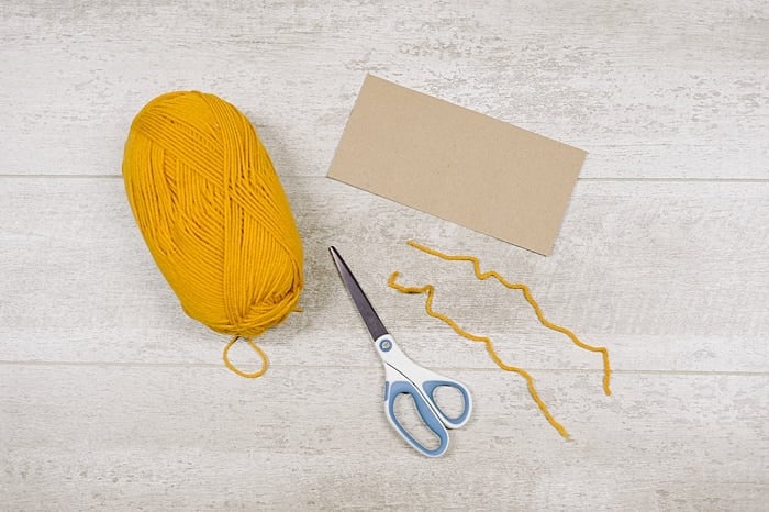 supplies for making tassels with cardboard