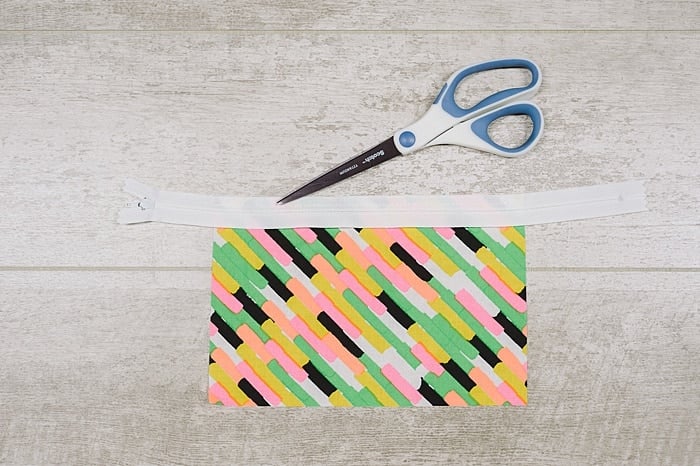 One side of mini zipper pouch.