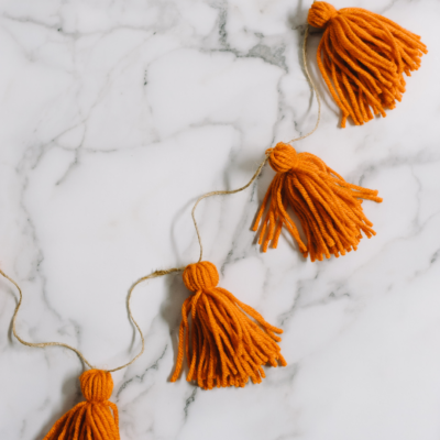 How to Make a Garland out of Yarn Tassels