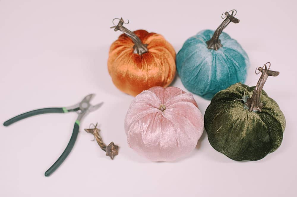 how to make diy fabric pumpkins from the dollar store