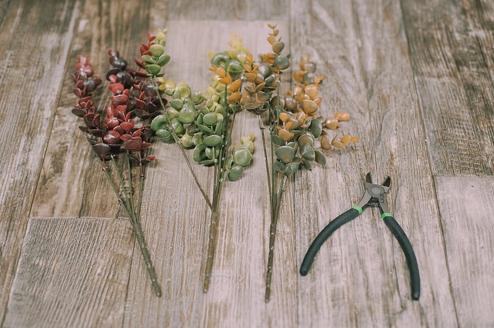 spread out fake eucalyptus bundles