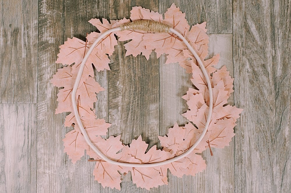 back side of wreath made of faux leather leaves