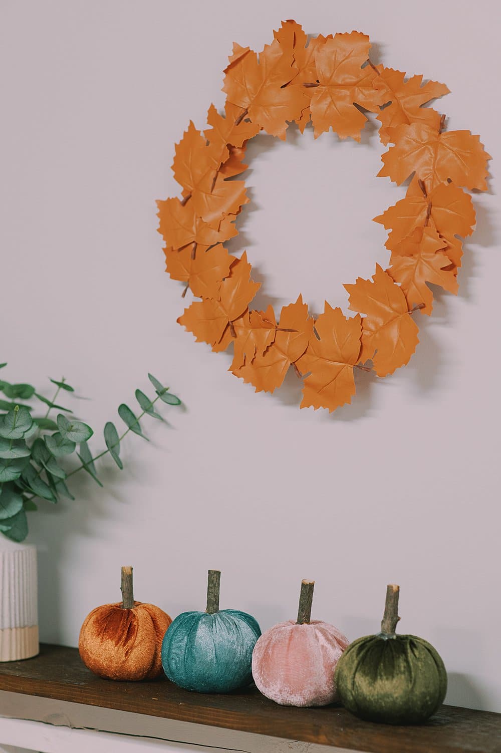 faux leather leaves made into a wreath