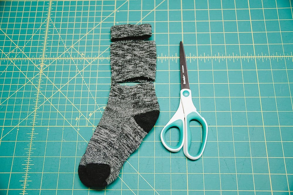 An old sock with the tube part cut of, to be used to make a fabric pumpkin.