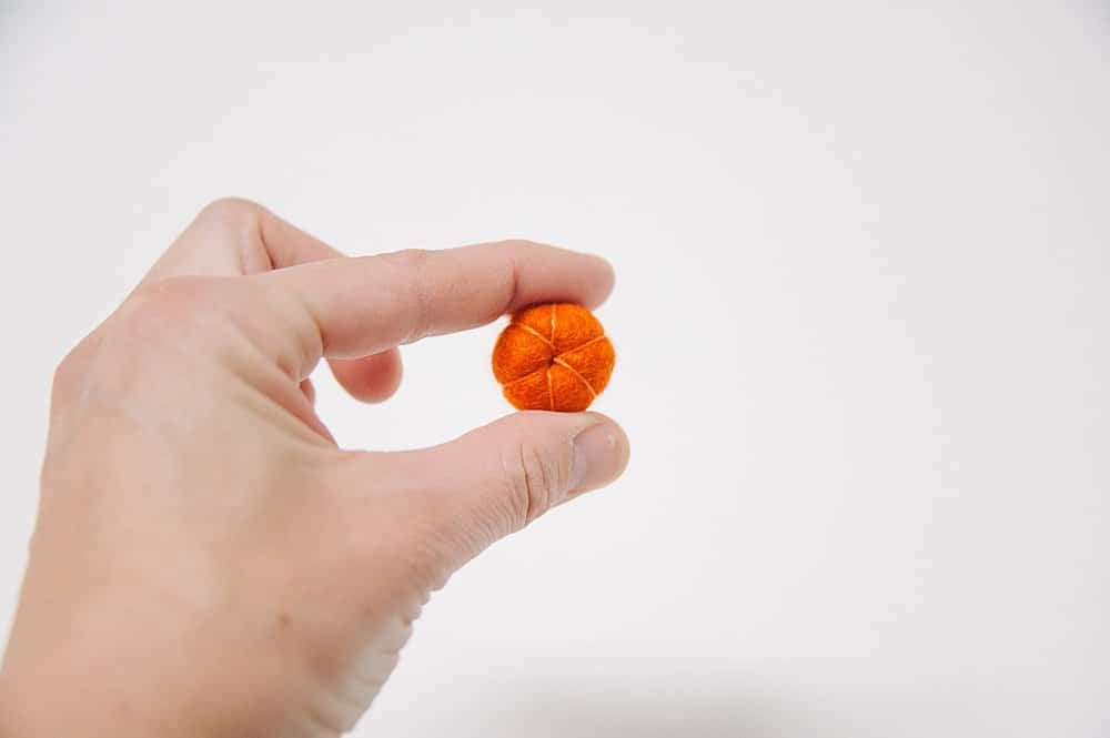 The top of a felt ball pumpkin.