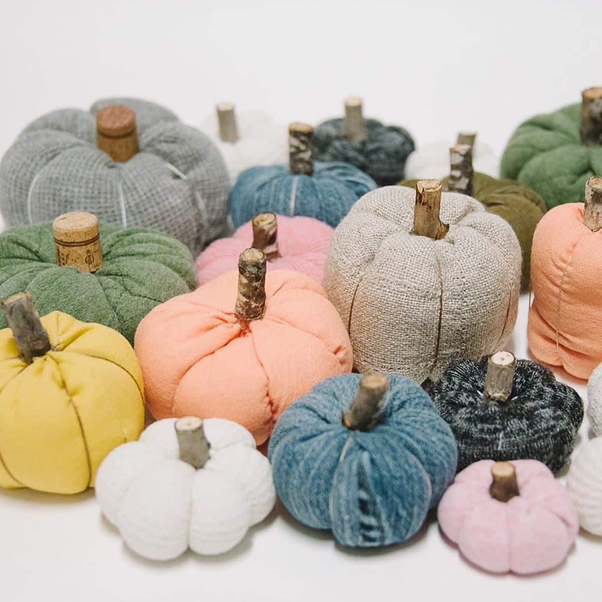 How to make fabric pumpkins with wooden stick stems.