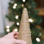 How to make DIY Christmas Trees using cones wrapped with rope, yarn, or jute.
