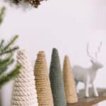 How to make DIY Christmas Trees using cones wrapped with rope, yarn, or jute.