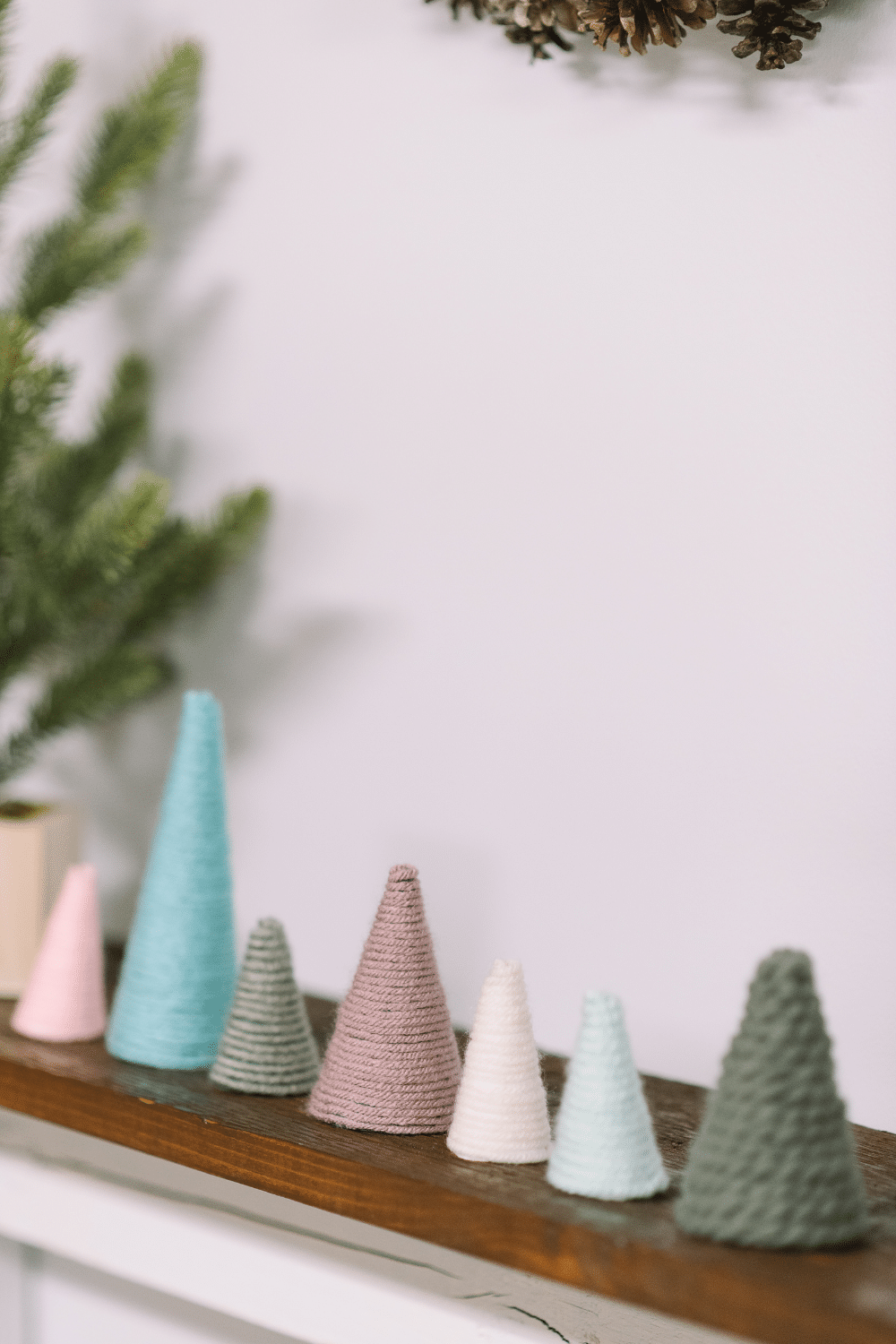 How to Make Mini Christmas Trees with Paper Cones and Yarn