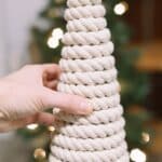 How to make DIY Christmas Trees using cones wrapped with rope, yarn, or jute.