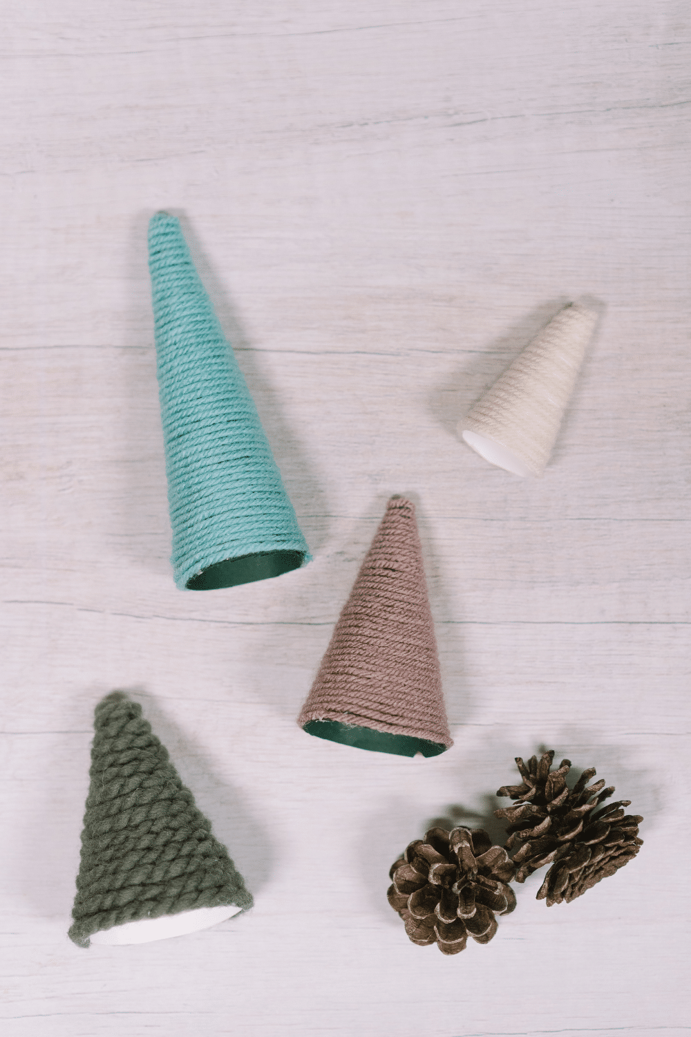 How to Make Mini Christmas Trees with Paper Cones and Yarn