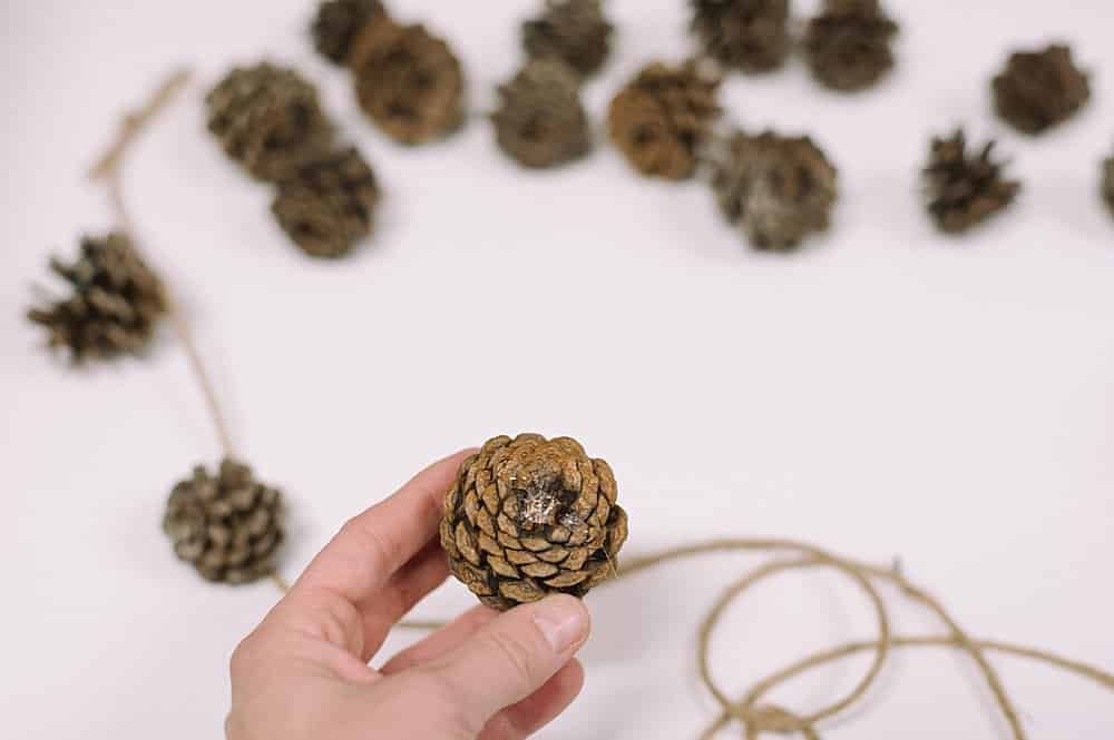 How to make a pinecone garland.