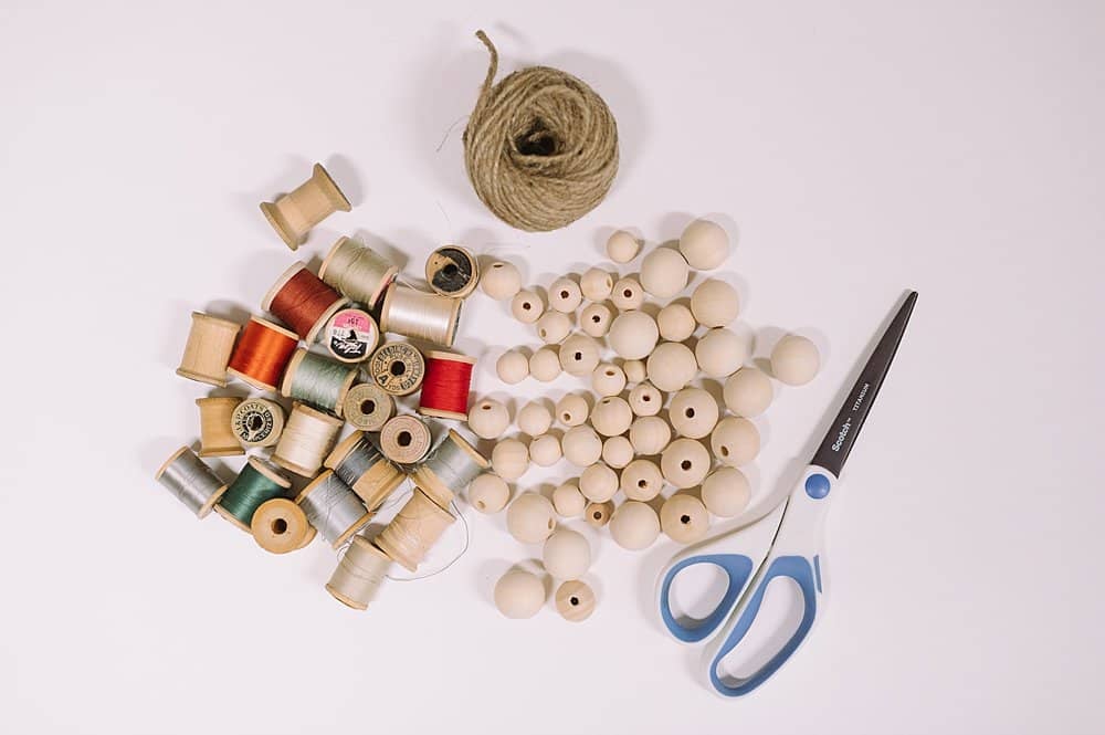 supplies for DIY thread spool and wood bead garland