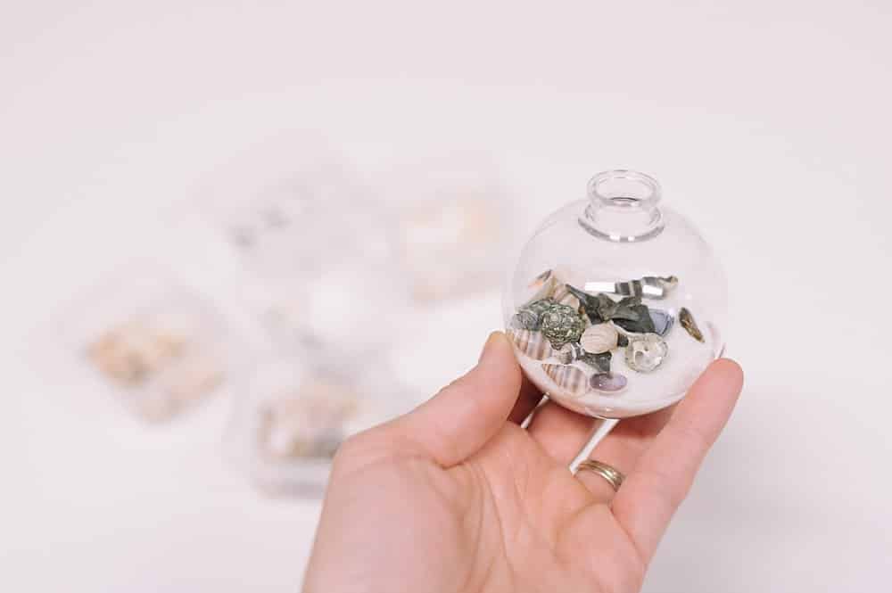 seashells inside clear Christmas ornament