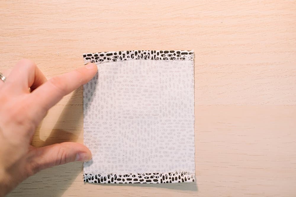 sew the edges down on fabric rectangle