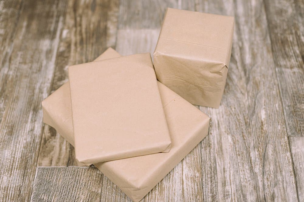 wrap christmas gifts with brown kraft paper