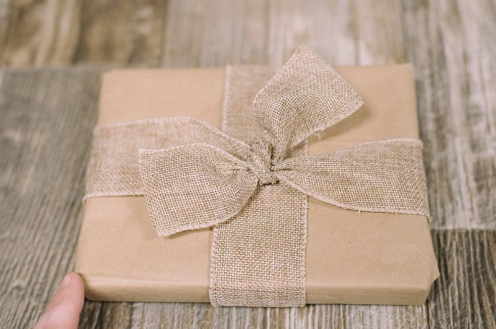 kraft wrapping paper and burlap ribbon bow