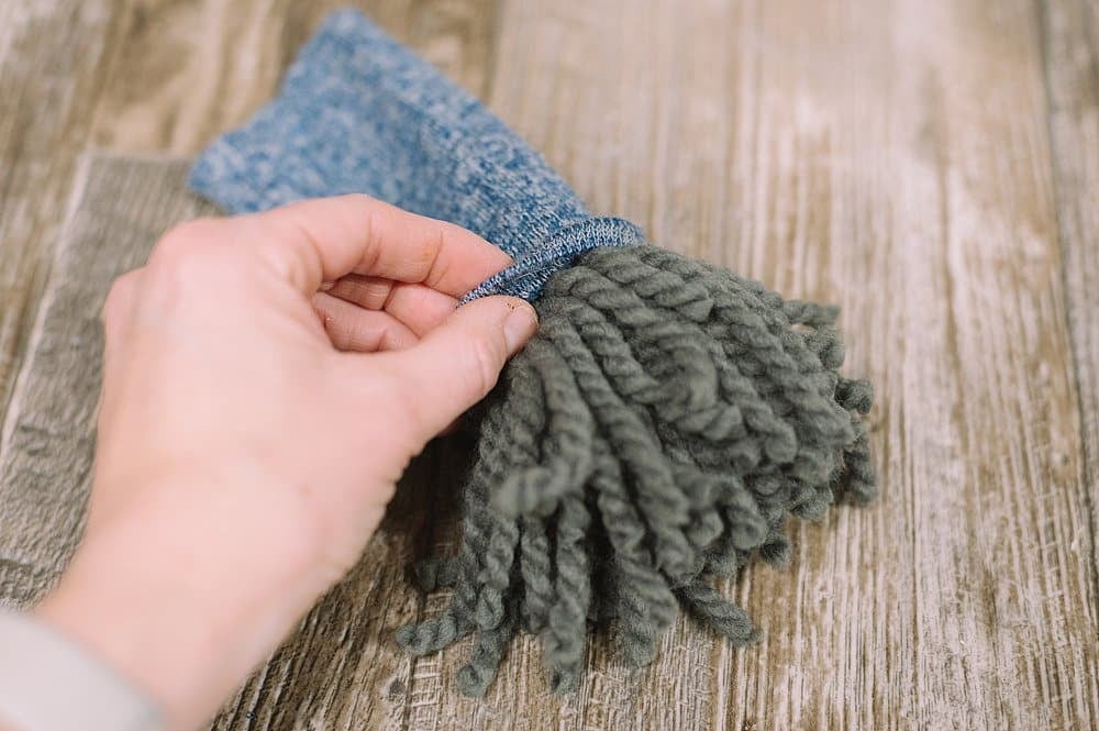 The tube part of a sock becomes the hat of the gnome.