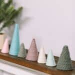 how to make mini christmas trees with paper cones and yarn