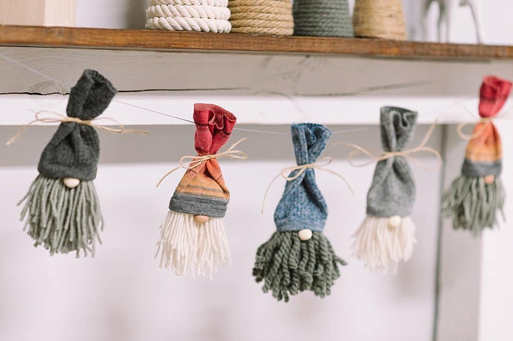 A garland made out of DIY yarn and sock gnomes.