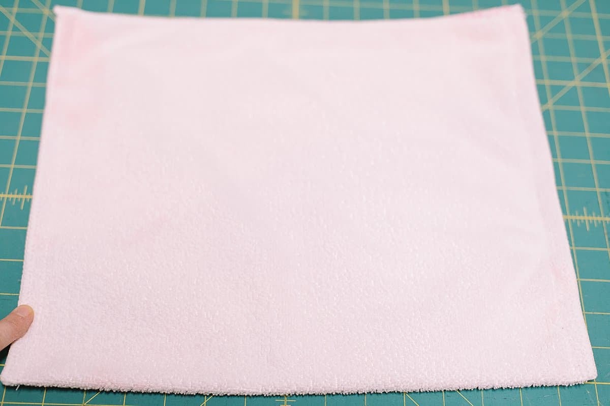 breast cancer hand towel turning into a DIY tote bag