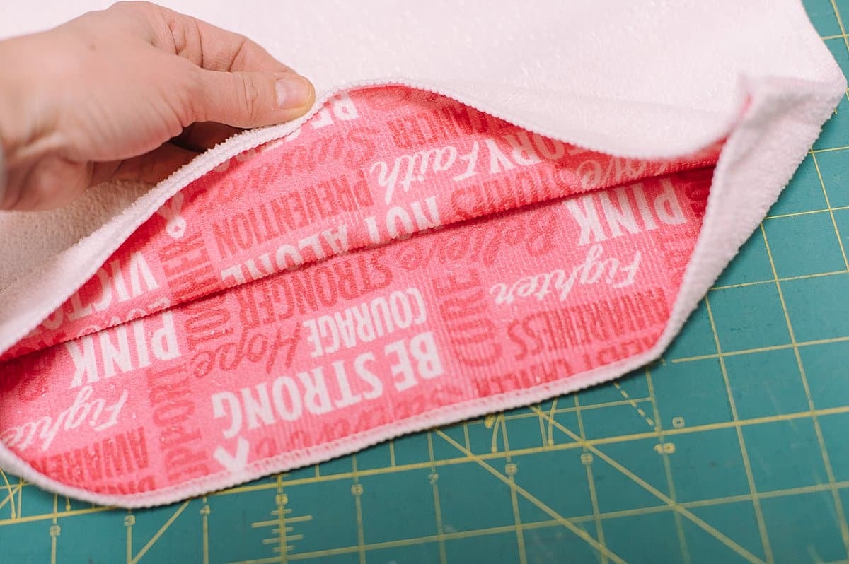 breast cancer hand towel turning into a DIY tote bag