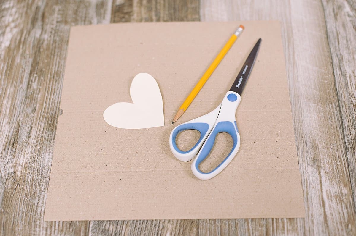 Cardboard and a paper heart template.