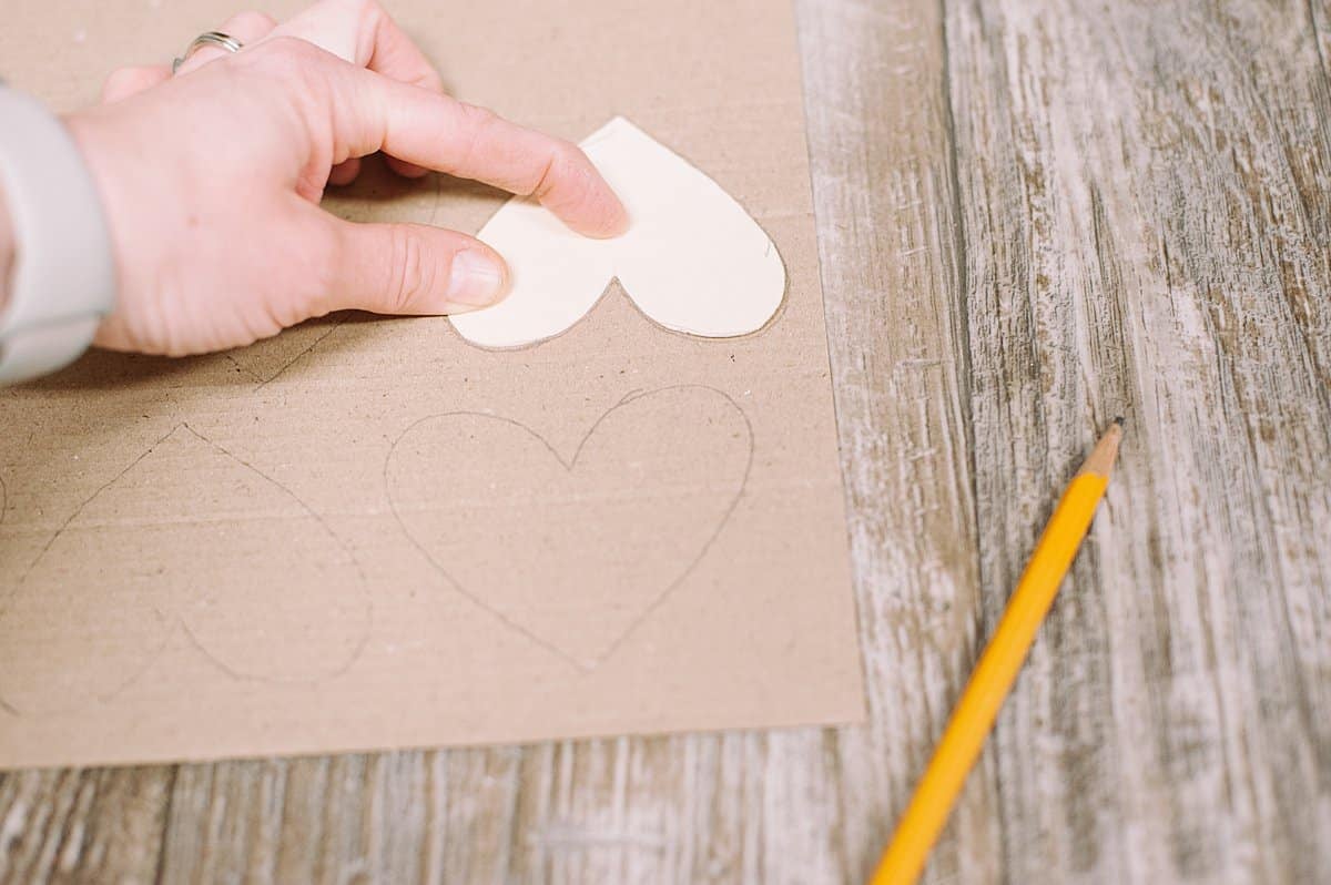 trace heart shapes on cardboard