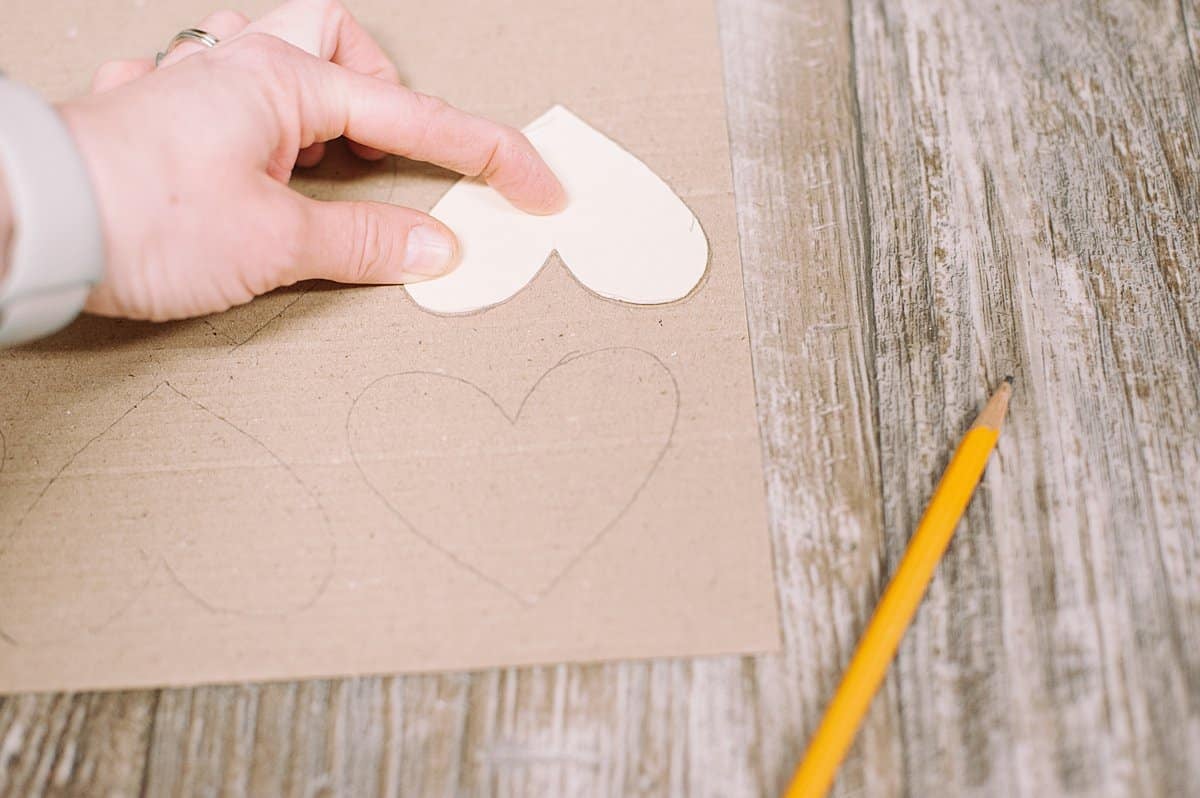 Trace heart shapes on cardboard.
