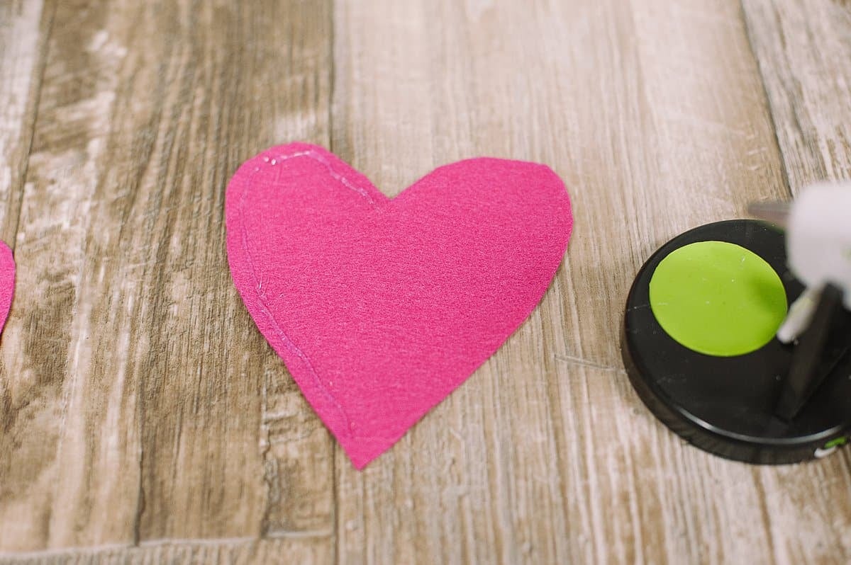 Hot glue felt hearts.