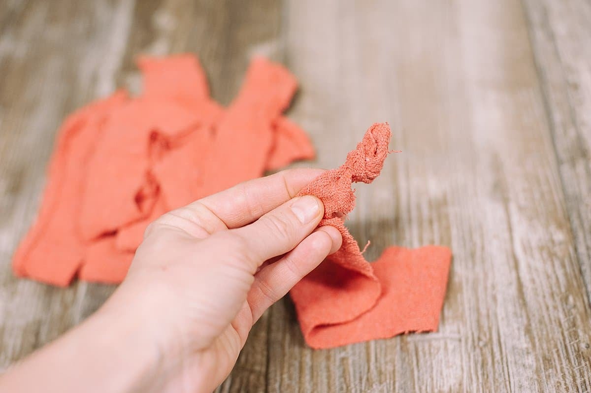 tie a knot in the beginning of a fabric strip