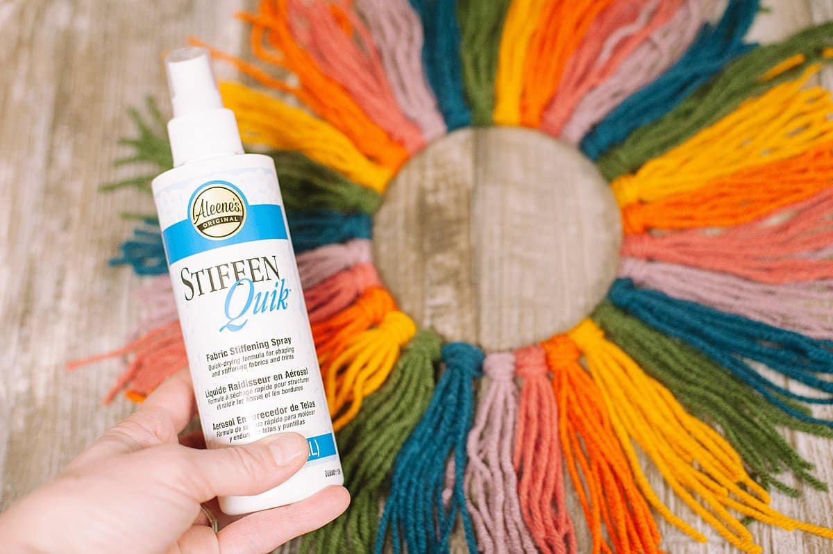 spray yarn wreath with stiffening spray