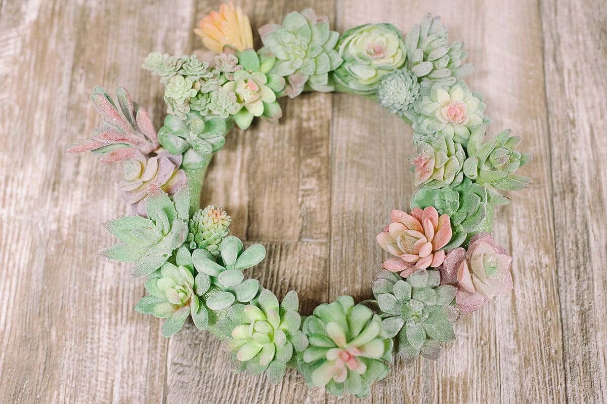 continue adding faux succulents to the wreath