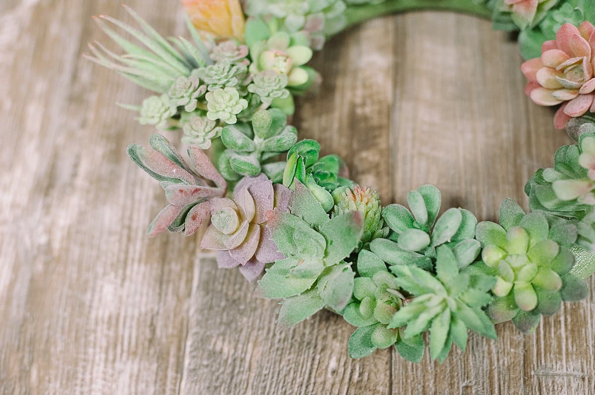 continue adding faux succulents to the wreath