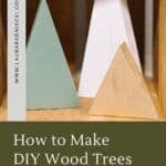 Learn how to make DIY wood trees for Christmas with wood boards and spray paint. These wooden Christmas trees are a simple, rustic, humble holiday decor idea, perfect for your mantel.