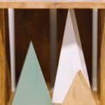 Learn how to make DIY wood trees for Christmas with wood boards and spray paint. These wooden Christmas trees are a simple, rustic, humble holiday decor idea, perfect for your mantel.