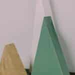 Learn how to make DIY wood trees for Christmas with wood boards and spray paint. These wooden Christmas trees are a simple, rustic, humble holiday decor idea, perfect for your mantel.