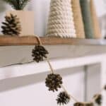 How to make a pinecone garland using clean pinecones and twine. It's the perfect garland for fall!