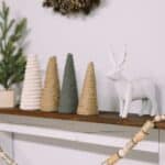 How to make a garland out of thread spools and wooden beads for Christmas.
