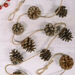 How to make a pinecone garland using clean pinecones and twine. It's the perfect garland for fall!