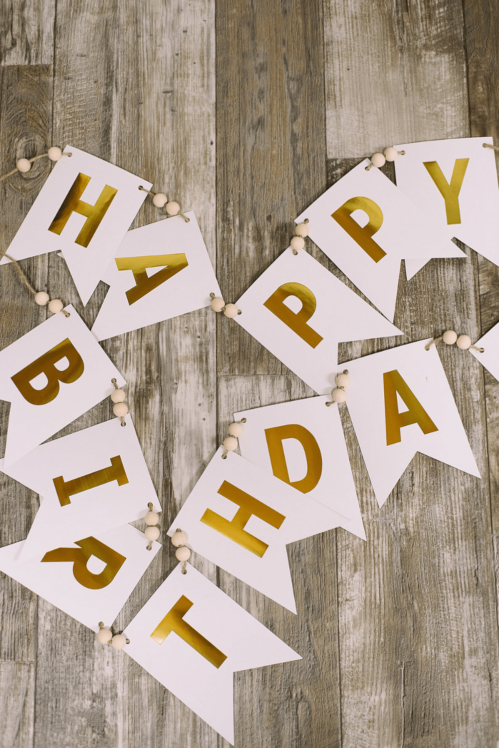 DIY Happy Birthday Banner with Twine and Wood Beads