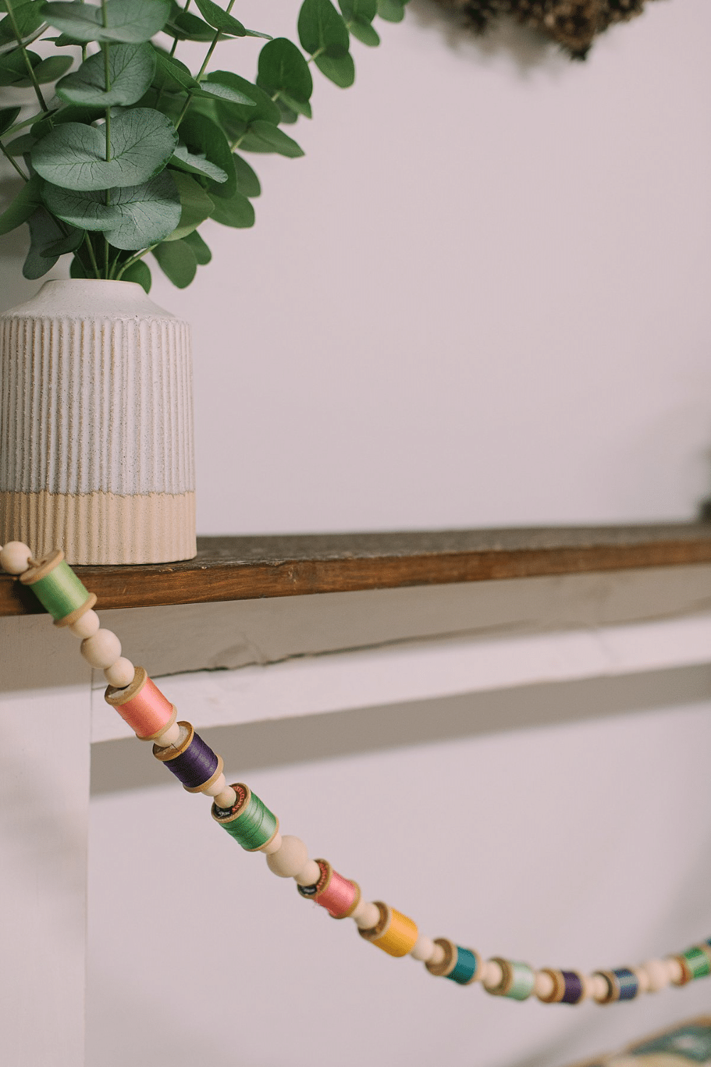 DIY Colorful Garland with Spools of Thread and Wooden Beads