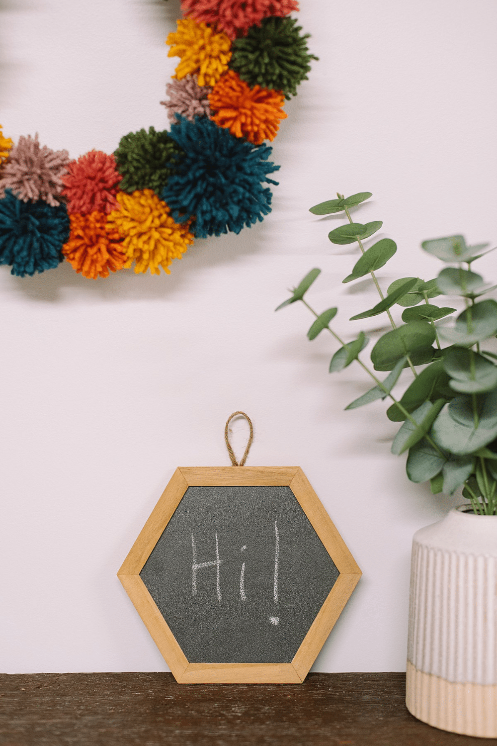 How to Make a Rainbow Pompom Wreath