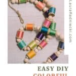 How to make a colorful garland with wood beads and thread spools.