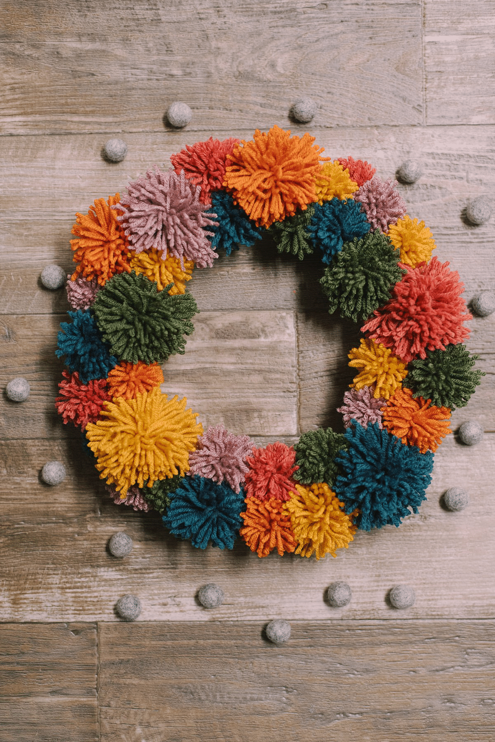 How to Make a Rainbow Pompom Wreath