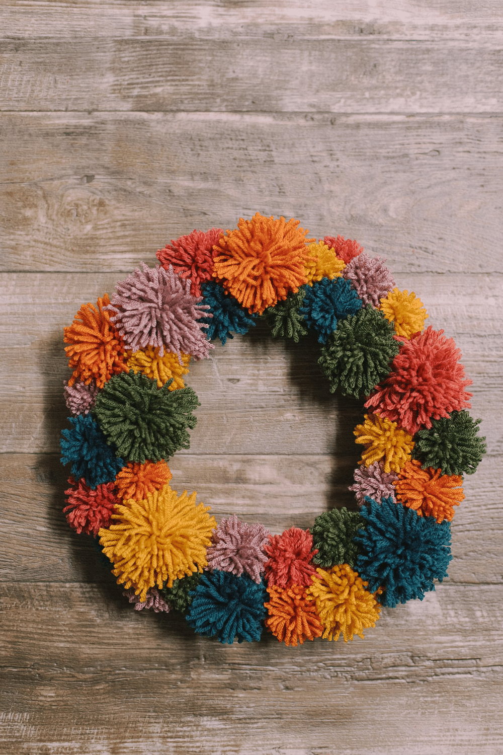 How to Make a Rainbow Pompom Wreath