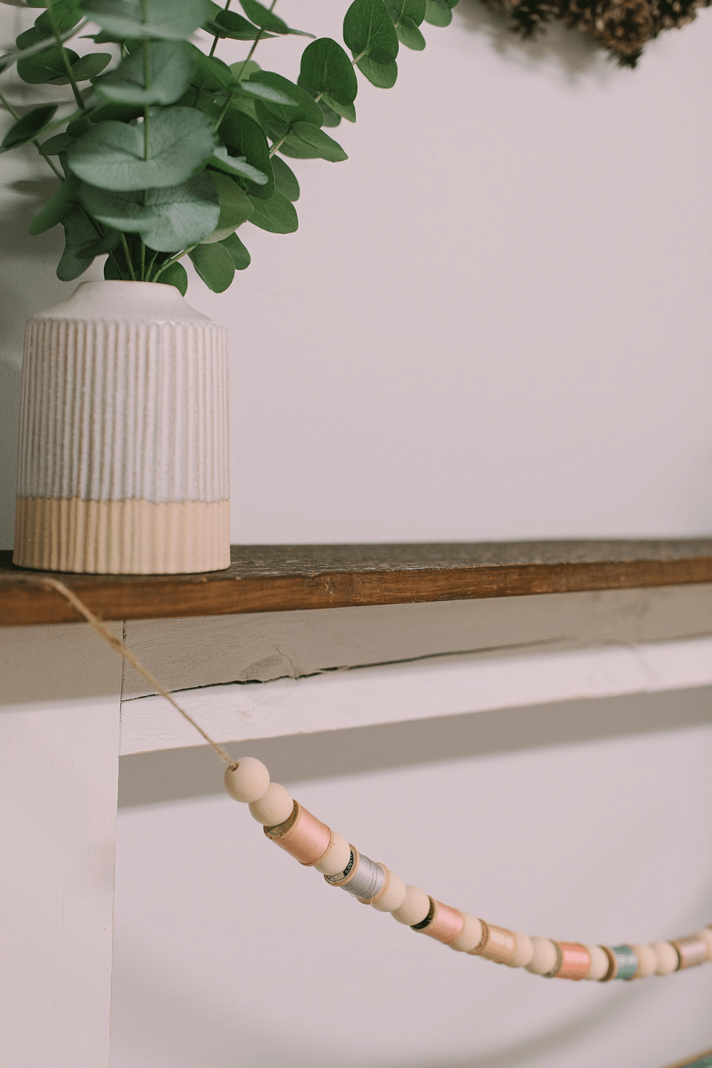 How to Make a Garland for Spring with Wood Beads and Spools of Thread